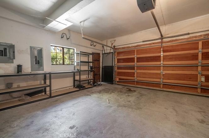 Oversized garage for lake toys and gear